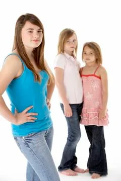 Group Of Girls Together In Studio Looking Unhappy Stock Photos
