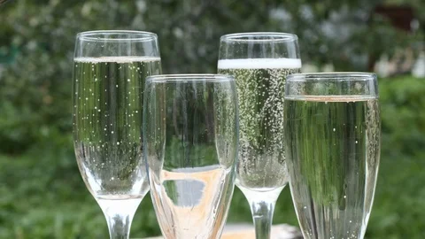 Group glasses with sparkling champaign with bubbles. Stock Footage 114637604