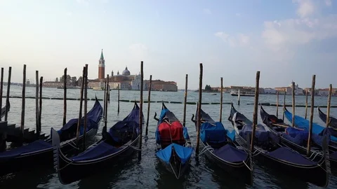 Group of Gondolas Floating in Venice Stock Footage 114578865