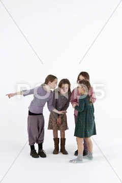 A group of gossiping little girls Stock Photos