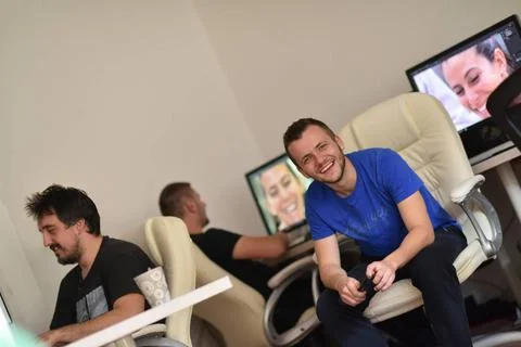 A group of graphic designers at work a group of young graphic designers wo... Stock Photos
