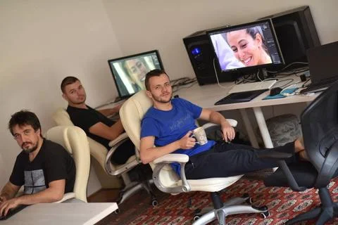 A group of graphic designers at work a group of young graphic designers wo... Stock Photos