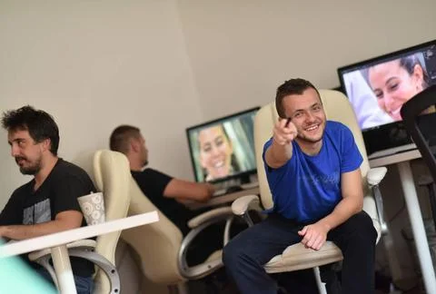 A group of graphic designers at work a group of young graphic designers wo... Stock Photos