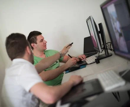 A group of graphic designers at work a group of young graphic designers wo... Stock Photos