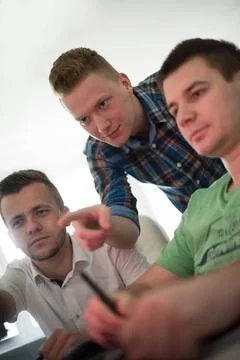A group of graphic designers at work a group of young graphic designers wo... Stock Photos