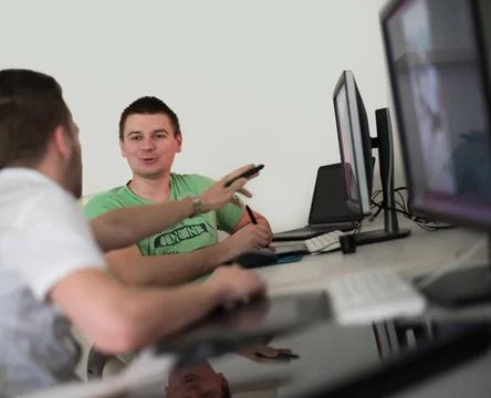 A group of graphic designers at work a group of young graphic designers wo... Stock Photos
