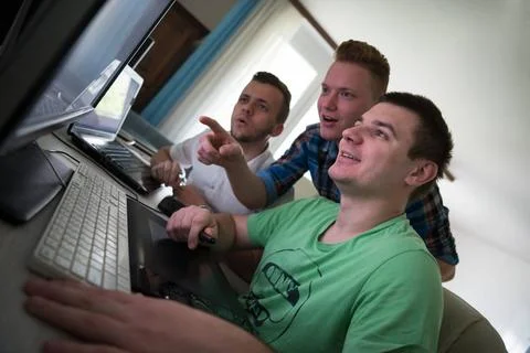 A group of graphic designers at work a group of young graphic designers wo... Stock Photos
