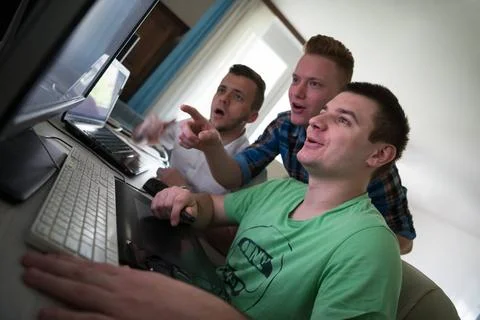 A group of graphic designers at work a group of young graphic designers wo... Stock Photos
