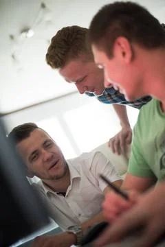 A group of graphic designers at work a group of young graphic designers wo... Foto stock