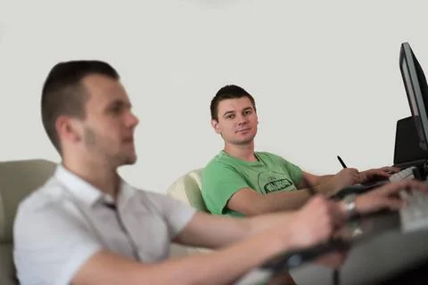 A group of graphic designers at work a group of young graphic designers wo... Stock Photos