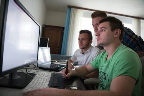 A group of graphic designers at work Stock Photos