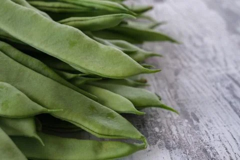 Group of green beans on white table Stock Photos