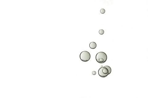 A group of grey air bubbles is isloated over a white background Stock Photos