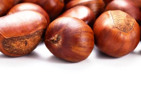 Group of grilled chestnuts. Isolate on white background. Foto stock