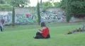 group of guys makes a joke to his friend at the park HD Footage