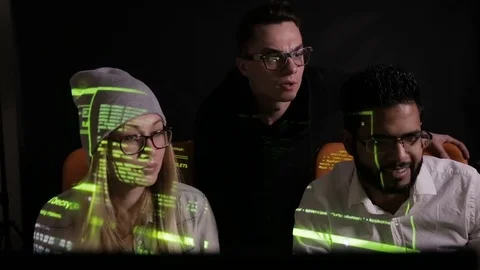 Group of hacker using computer code in dark Stock Footage 69794675