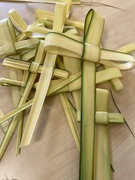 A group of handmade palms on a table Stock Photos
