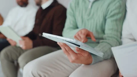 Group, hands and applicant with tablet, waiting room and practice for interview Stock Footage 312494927