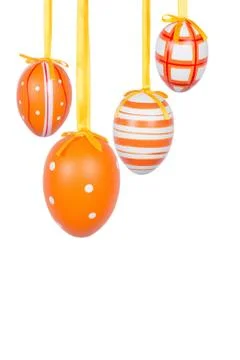 Group of hanging Easter eggs on a white background Stock Photos