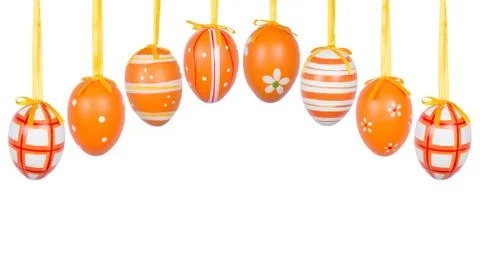 Group of hanging Easter eggs on a white background Stock Photos