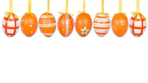 Group of hanging Easter eggs on a white background Stock Photos