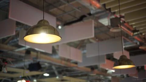 A group of hanging lights with shallow depth of field. Stock Photos