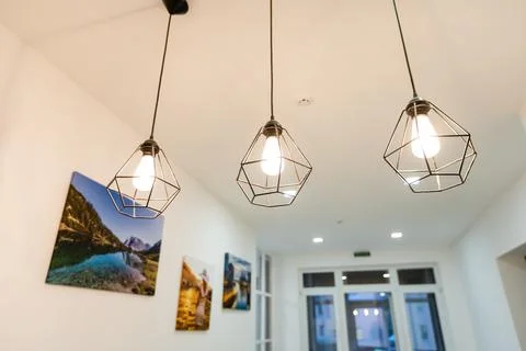 A group of hanging lights with shallow depth of field. Stock Photos