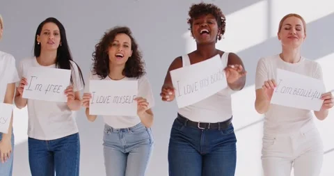 Group of happy beautiful young diverse women promoting self love and self Stock Footage 321676189