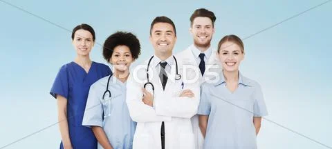 Group of happy doctors over blue background Stock-Fotos