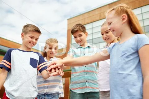 Group of happy elementary school students Stock Photos