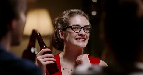 Group of happy friends having fun together, drinking beer and clinking their Video stock 132925014