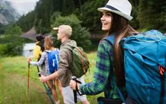 Group of happy hiker friends trekking as part of healthy lifestyle