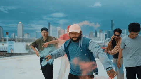 Group of happy multicultural hipster playing color flare at rooftop. hiphop. Stock Footage 257434642