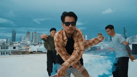 Group of happy multicultural hipster playing color flare at rooftop. hiphop. Stock Footage 257749351
