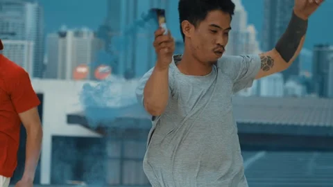 Group of happy multicultural hipster playing color flare at rooftop. hiphop. Stock Footage 257900244