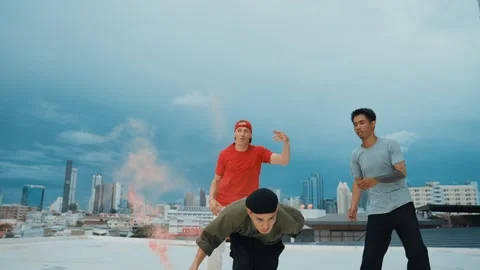 Group of happy multicultural hipster playing color flare at rooftop. hiphop. Stock Footage 260730198