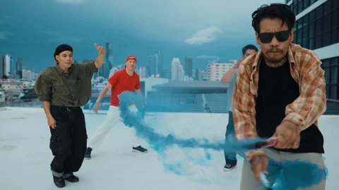 Group of happy multicultural hipster playing color flare at rooftop. hiphop. Stock Footage 262183805