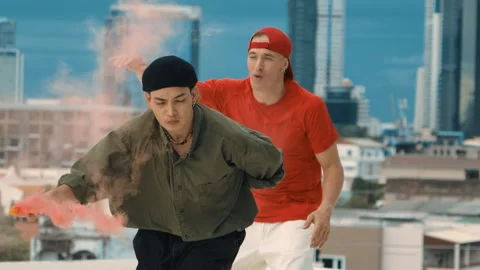 Group of happy multicultural hipster playing color flare at rooftop. hiphop. Stock Footage 263553782