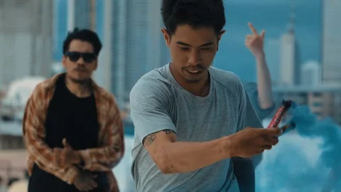 Group of happy multicultural hipster playing color flare at rooftop. hiphop. Stock Footage 264977044