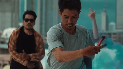 Group of happy multicultural hipster playing color flare at rooftop. hiphop. Stock Footage 275087630