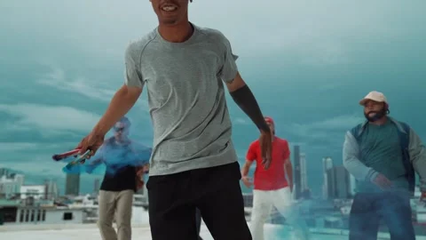 Group of happy multicultural hipster playing color flare at rooftop. hiphop. Stock Footage 275848513