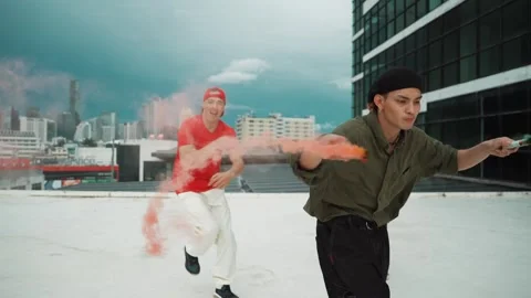 Group of happy multicultural hipster playing color flare at rooftop. hiphop. Stock Footage 277218860