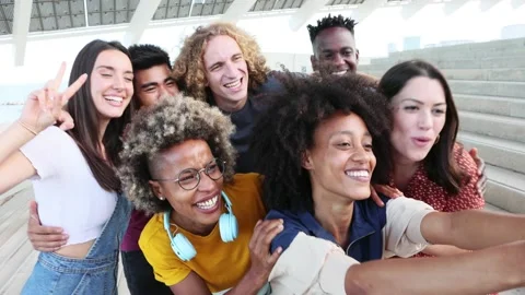Group of happy multiracial people taking a selfie with mobile phone Stock Footage 156863406