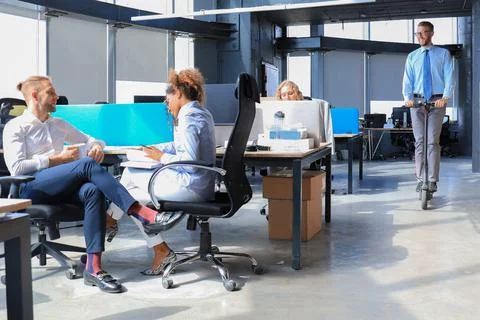 Group of happy progressive business people working on startup together at cre Stock Photos