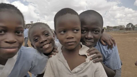 A group of happy school children posing for the camera Stock Footage 108983656