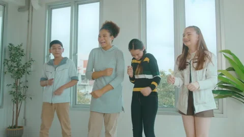 Group of  happy  students are dancing in classroom , education concept. Stock Footage 171172783