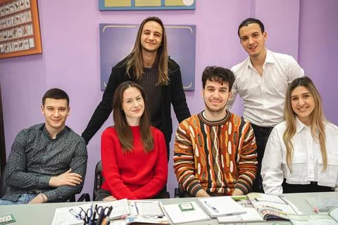 Group of happy students at language school class Stock Photos