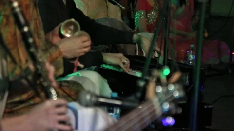 Group of Hare Krishna People Playing Traditional Indian Instruments Close-up.. Stock Footage 103985217
