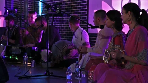 Group of Hare Krishna People Playing Traditional Indian Instruments. Stock-Footage 103985267