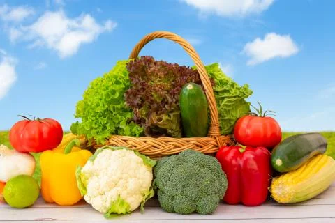 Group Healthy assorted fresh vegetable in a wooden basket, With vitamins c fr Stock Photos